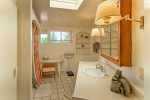The master en-suite bathroom is spacious with a bath/shower combo